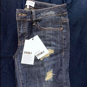 New pair of jeans size 1. Never worn, with tags